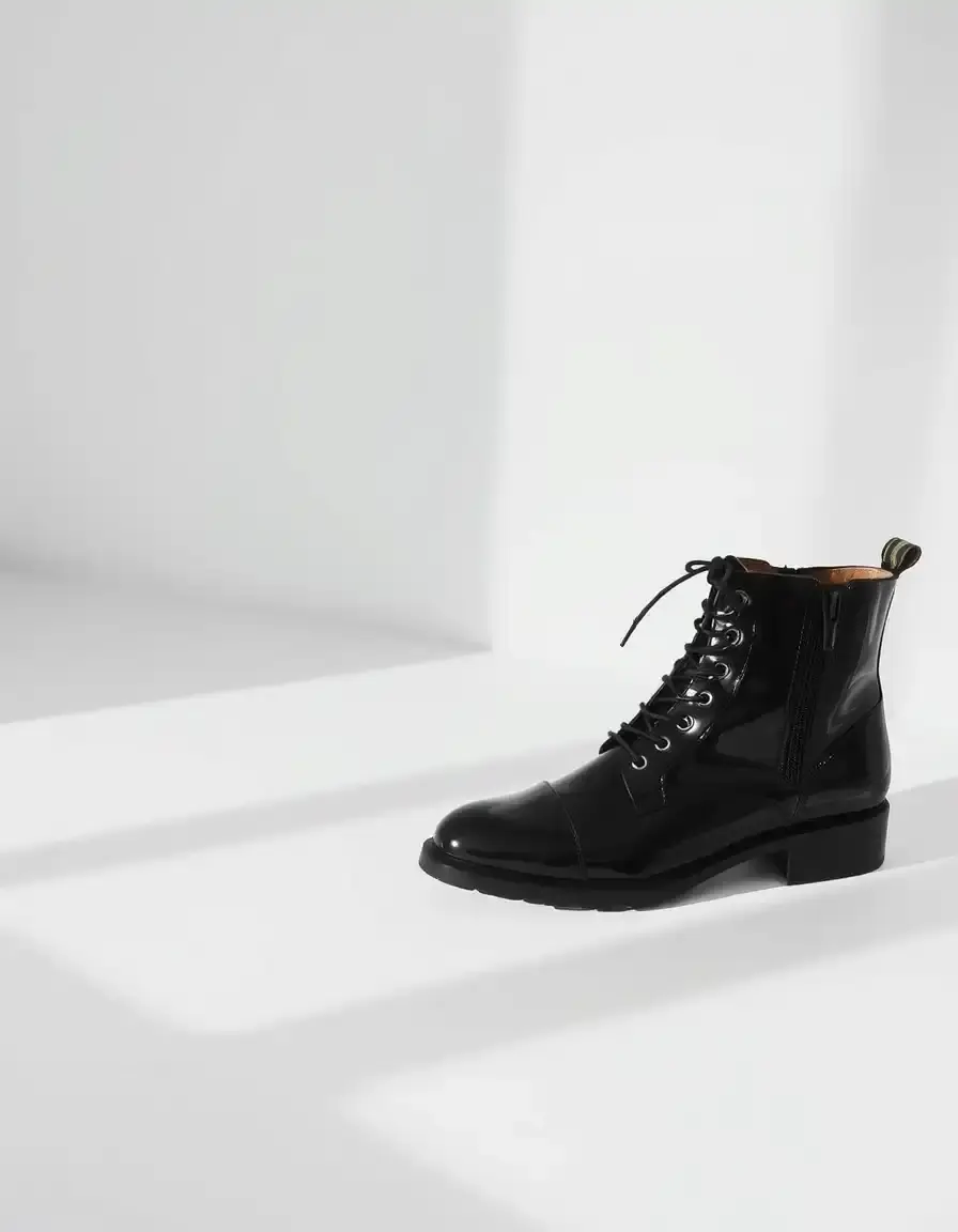 Black boot style patent leather shoes with high gloss
