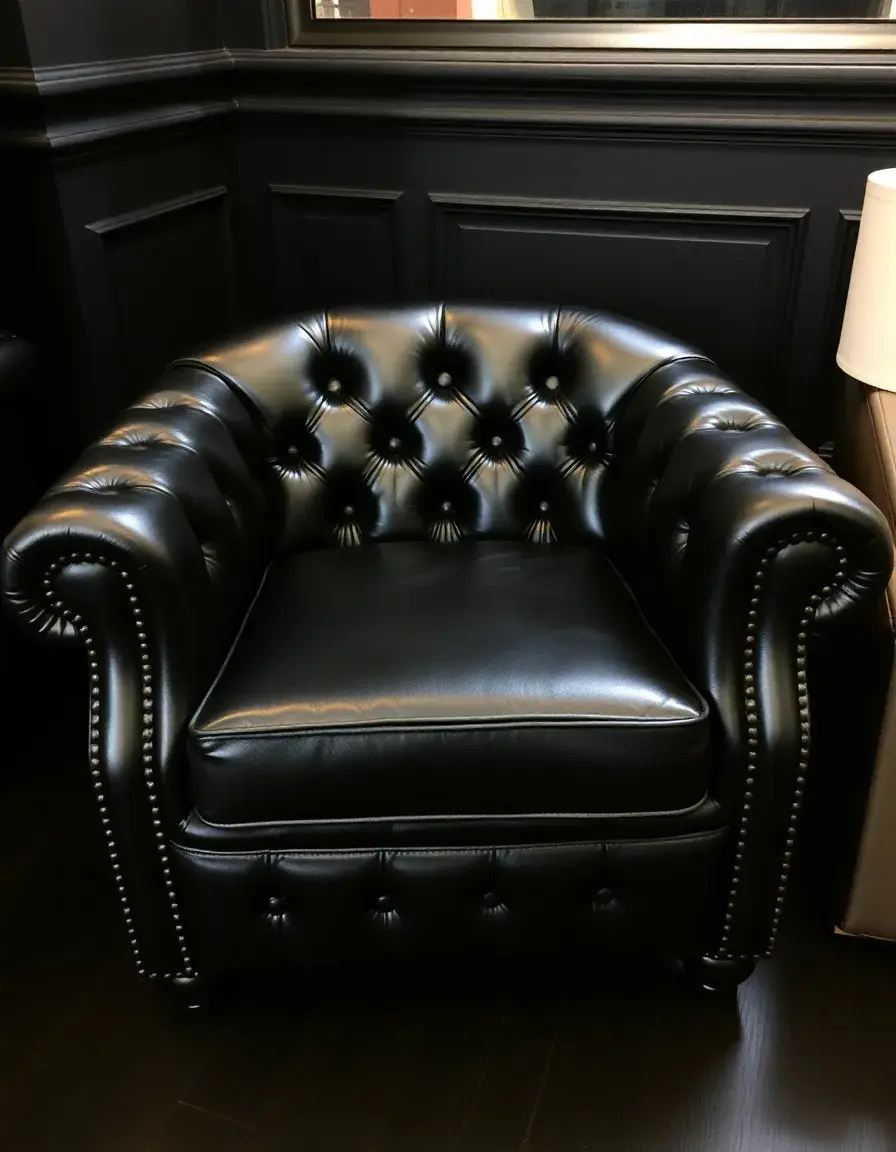 Black club leather armchair with tufted back