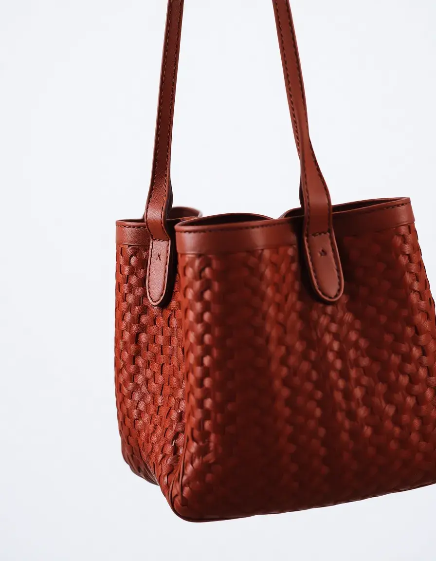 Brown woven leather handbag