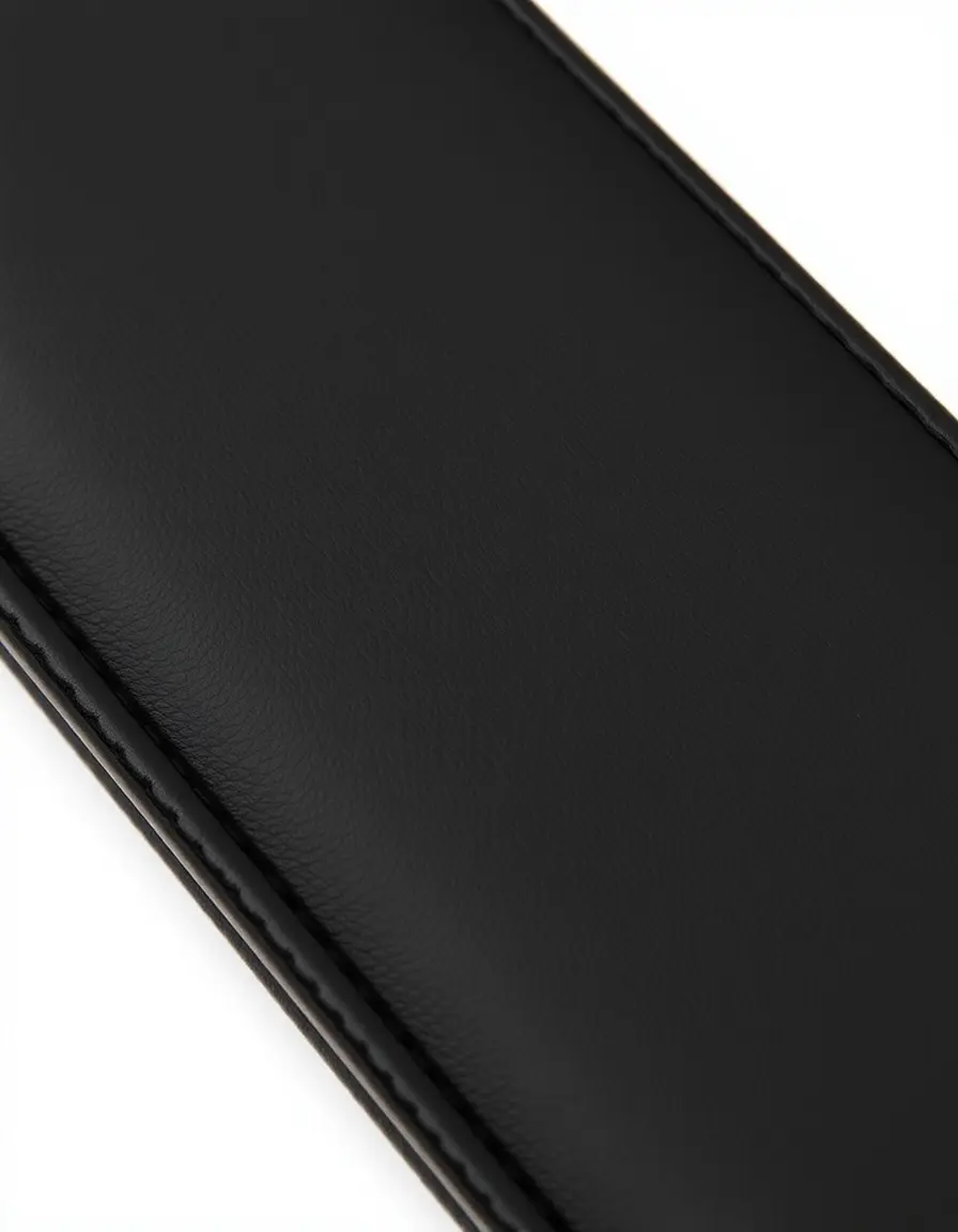 Black faux synthetic leather wallet on minimalist background