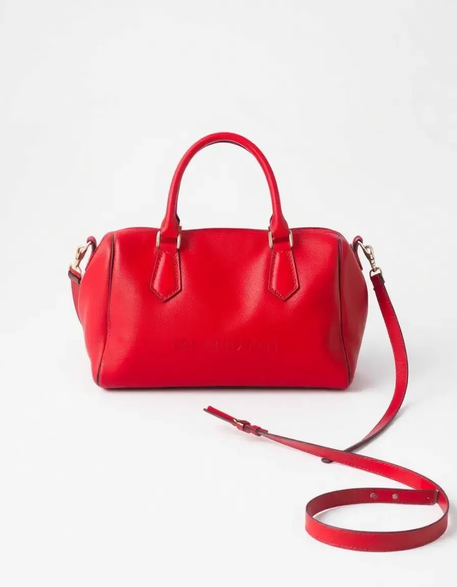 Red designer leather handbag