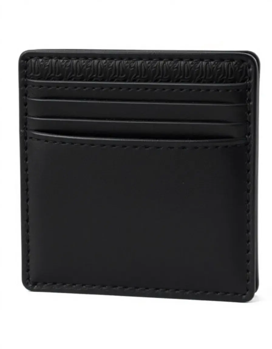 Close-up of a slim minimalist leather wallet showing fine grain and stitching