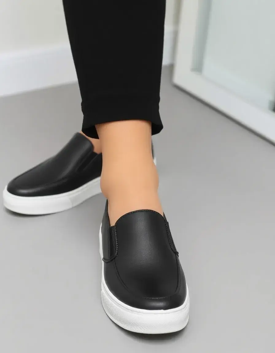 Black slip-on leather trainers women
