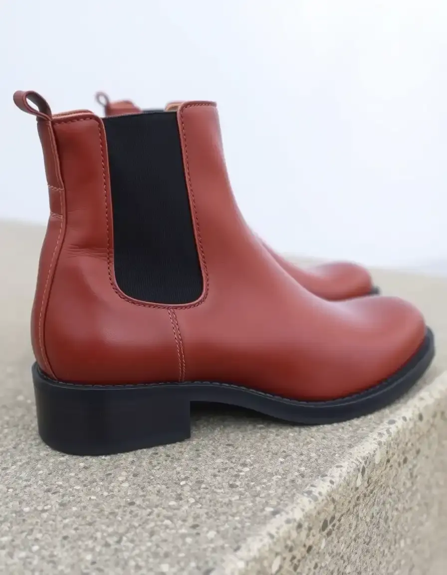 Brown chelsea leather ankle boots with elastic side panels