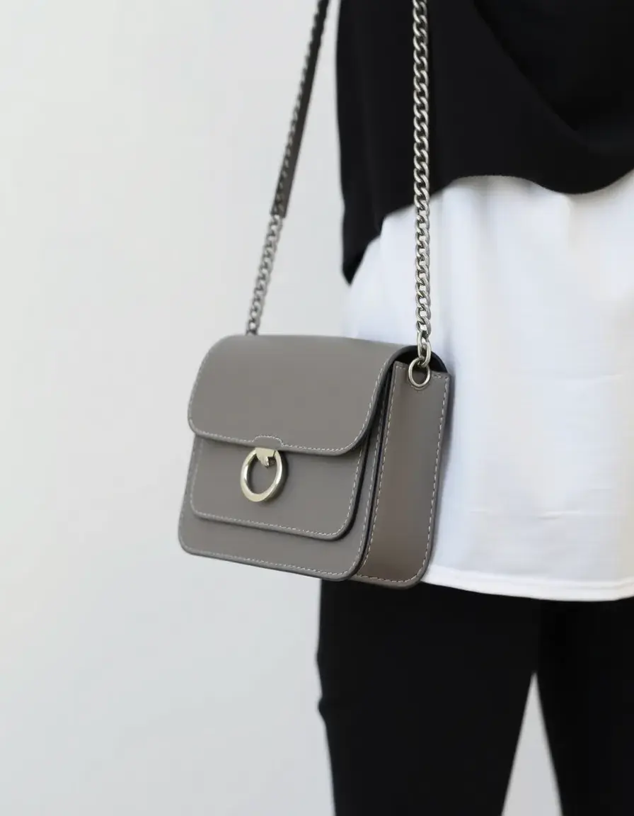 Gray chain strap leather cross body bag